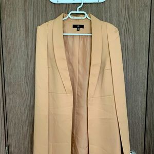 Misguided long vest with cape. Light beige colour, size 4